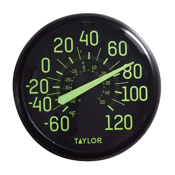 Glow in the dark outdoor thermometer with lime green numbers on a black dial