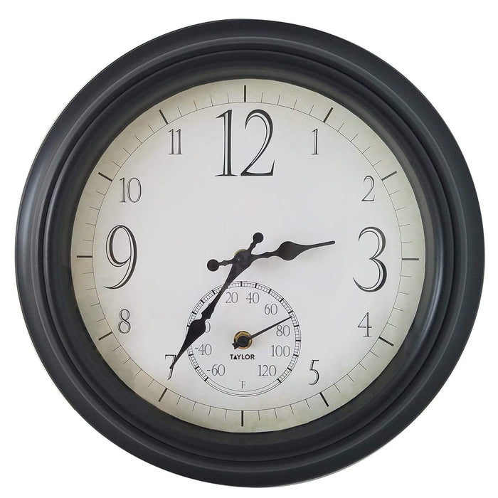 Close up of a 14 inch decorative wall clock with a built in thermometer in a black round frame and a white dial
