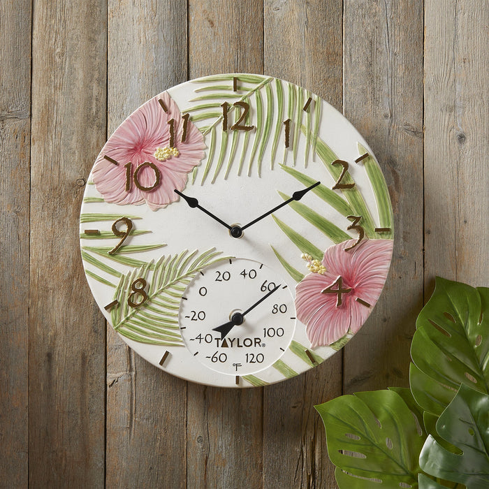 Front of 14 inch pink hibiscus poly resin clock with floral design and thermometer dial