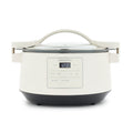 GreenPan 8-quart slow cooker in cloud cream with locking lid, handle, and digital display on a white background.