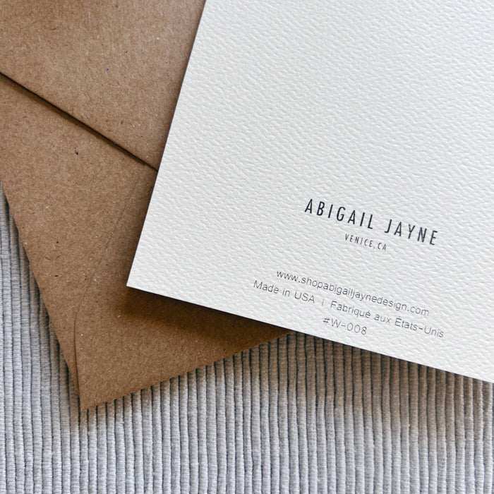 Abigail Jayne Design greeting card with kraft envelope on textured neutral background