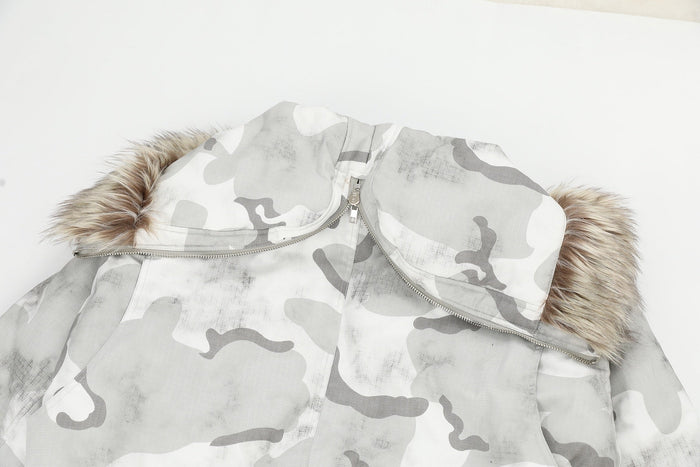 Top close-up of snow camo hood with fur trim and front zipper