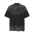 Black acid wash oversized T-shirt with faded texture, raw hem, and distressed streetwear style on a white background