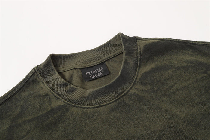 Olive acid wash oversized distressed T-shirt with raw-edge collar and faded punk streetwear style