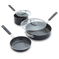 Set of three black ceramic pots and pans with glass lids on a white background.
