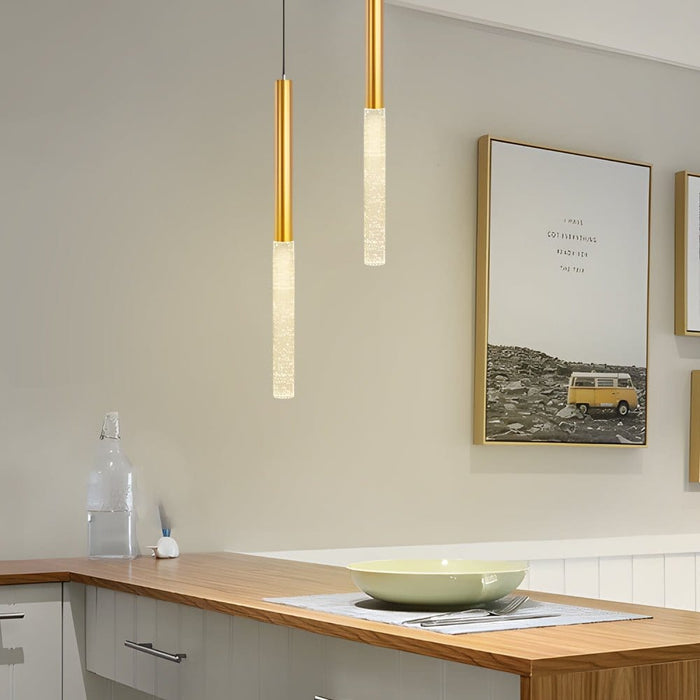 Bubble-Textured Elongated Aluminum Cylinder Pendant Light with 3-Step Colour Temperature in Gold | NordaLight