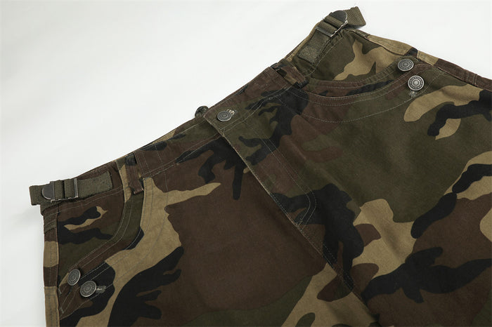 Close-up of camo cargo pants waistband and upper hip with belt detail