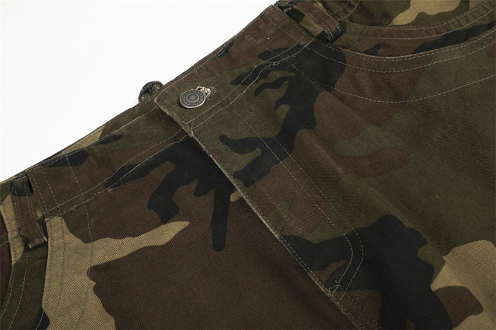 Close-up of camo cargo pants front waistband seam and snap button