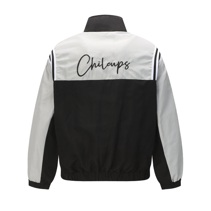 Back view of a white and black track jacket with Chilcups script across the upper back