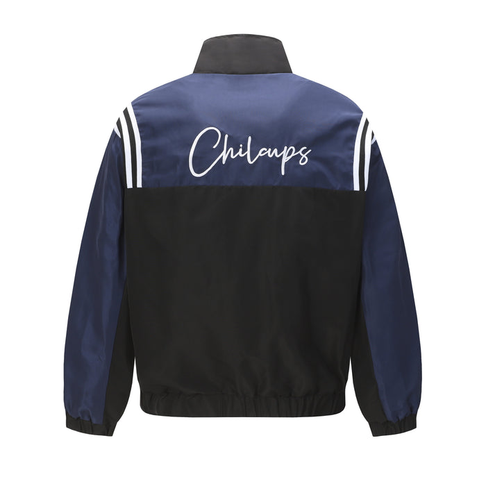 Back view of a navy and black track jacket with Chilcups script across the upper back
