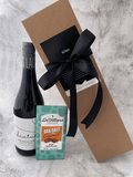 Choco-Cheers gift set with Lautus Non-Alcoholic Red Wine and chocolate slab, elegantly packed in a kraft box with a bow.