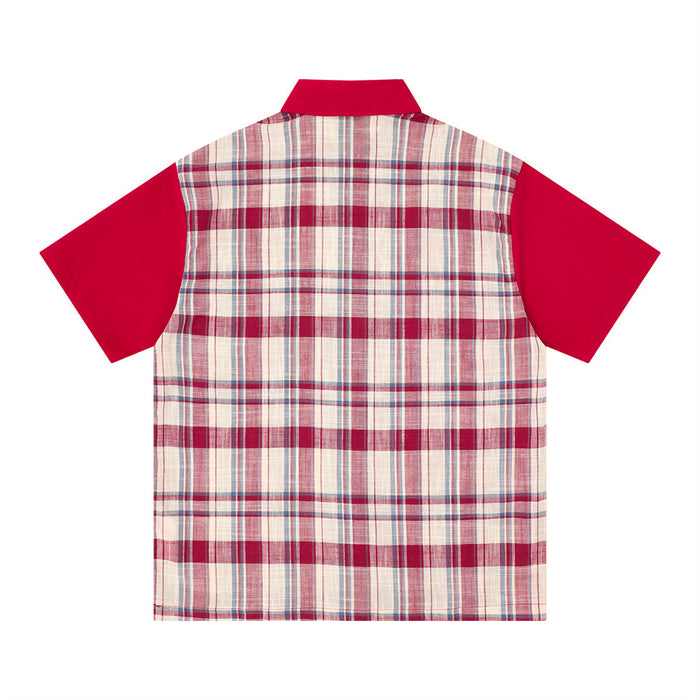 Back view of oversized short sleeve plaid shirt with solid red sleeves and navy collar