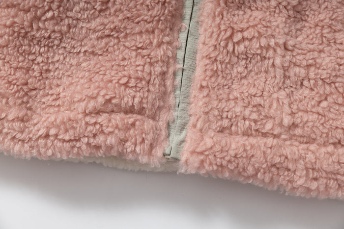 Pink sherpa fleece front hem with center zipper opening