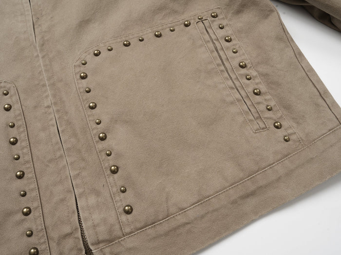 Front chest pocket detail on khaki studded cotton jacket