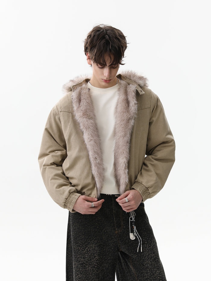 Tan bomber jacket worn open, showing detachable fur lining and hood