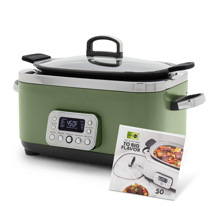 The Elite 14-in-1 6-Quart Slow Cooker | Sage with a digital display, simple presets, control buttons, and a glass lid sits next to a recipe booklet featuring the slow cooker and a tasty meal.