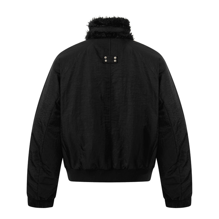 Black bomber jacket back view with faux fur collar and snap tab detail at the neck