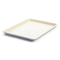 Quartz gray ceramic cookie sheet with raised edges, shown on a white background.