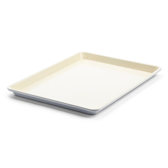 Quartz gray ceramic cookie sheet with raised edges, shown on a white background.