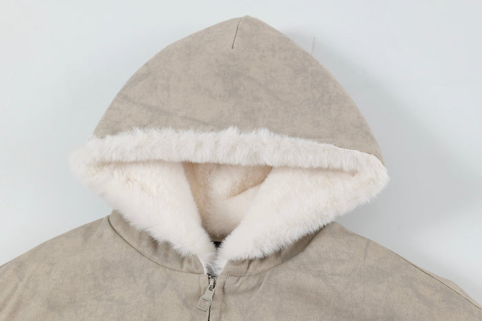 Close-up of hood on beige bomber jacket with white faux-shearling lining