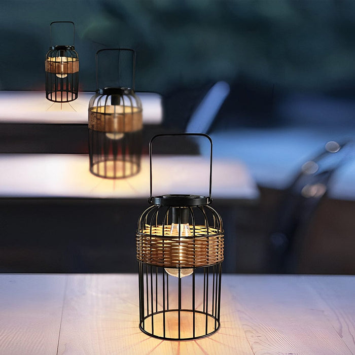 Handwoven Rattan Solar Outdoor Lantern Black Iron Portable Auto On Off IP55 Waterproof LED 6 Inch | NordaLight