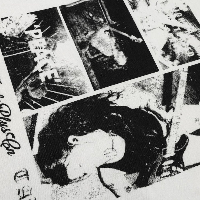 Close-up of black and white collage graphic print on white T-shirt