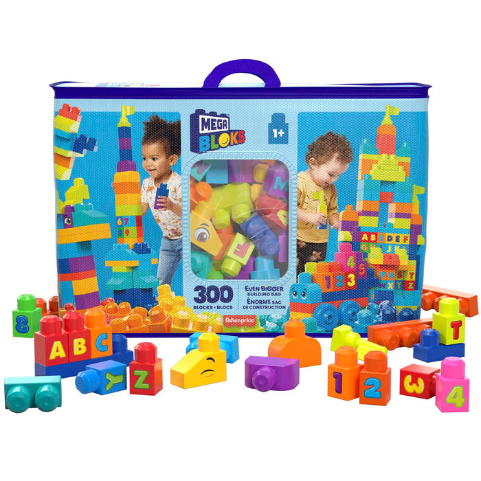 The MEGA Bloks Even Bigger Building Bag by Mega Bloks includes 300 colorful letter and number blocks for ages 1+, packed in a reusable blue zippered bag. Packaging shows two kids building and developing motor skills.