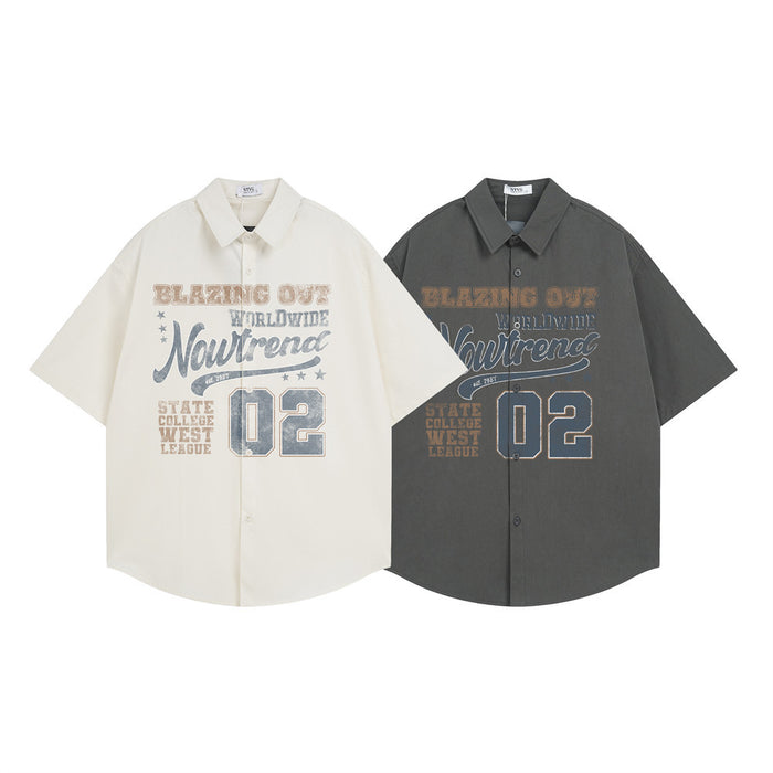 Oversized button-down shirt in cream and dark gray with American varsity front graphic