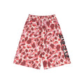 Pink camouflage wide-leg shorts with black gothic lettering on the right leg, front view