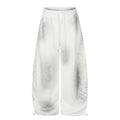 Men's wide leg tie-dye sweatpants in white with leopard print panels and cursive script graphic on the leg