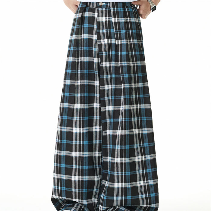 Front view of plaid wide-leg trousers with pleats and a button waistband