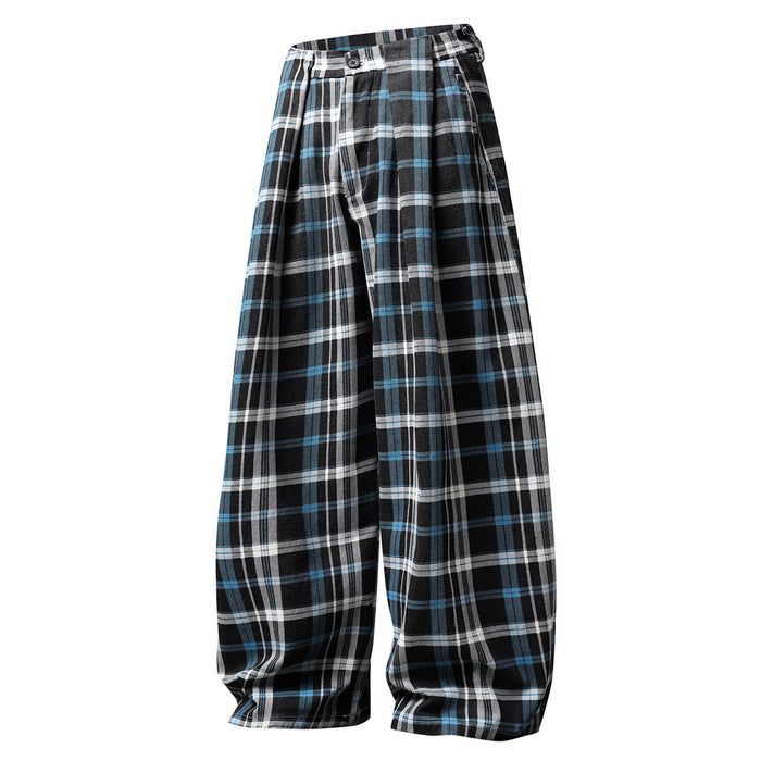 Angled front view of baggy plaid trousers with wide legs and pleated waist