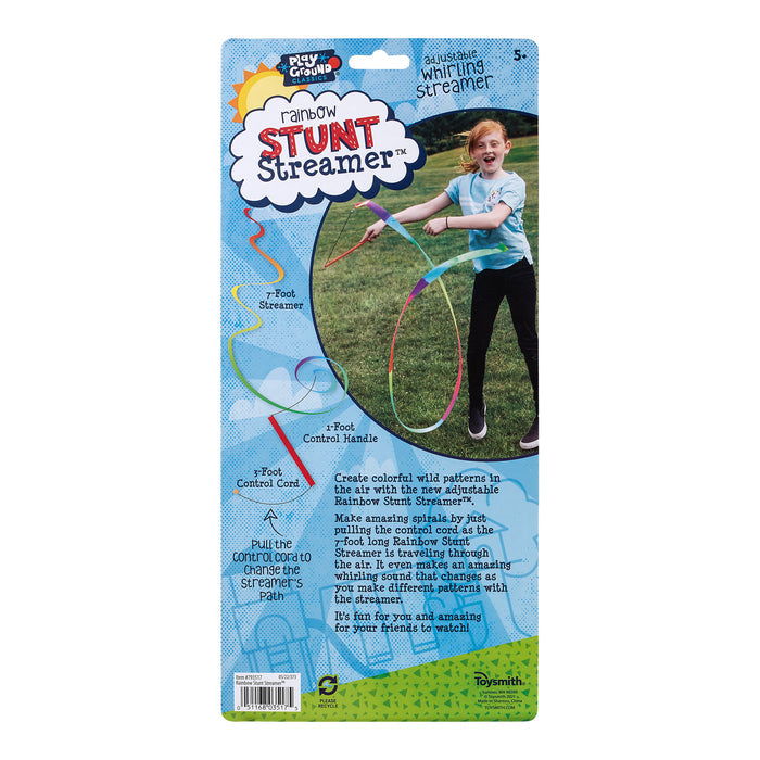 A young girl enjoys outdoor play with the Playground Classics Rainbow Stunt Streamer, creating swirling patterns. The Playground Classics packaging highlights creative movement, features, and instructions in a bright, playful design.