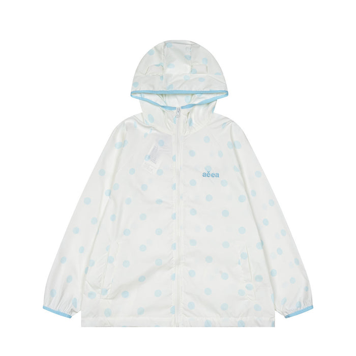 White polka dot hooded windbreaker jacket with zipper, front view