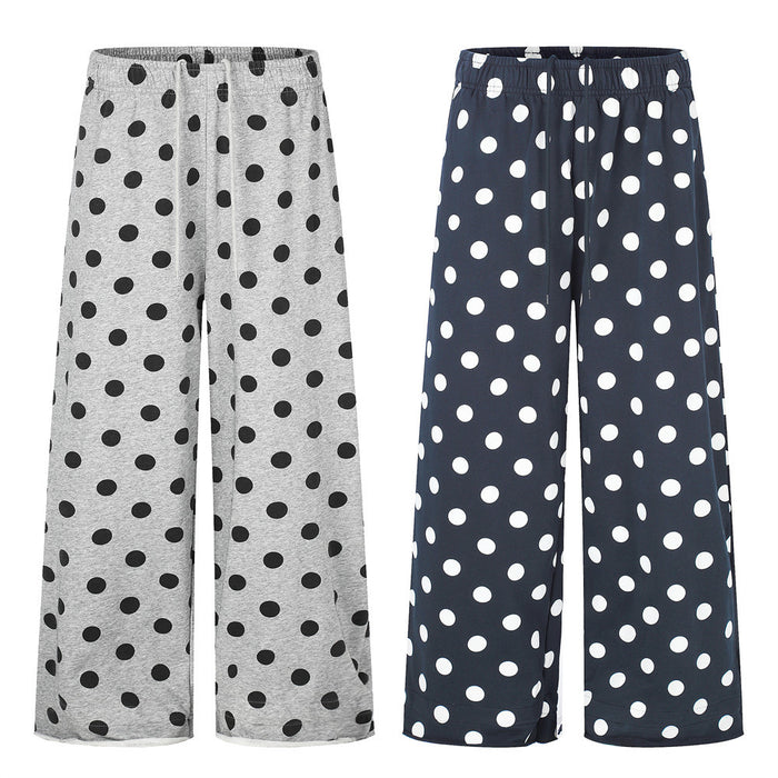 Gray and navy wide-leg pants with large polka dots, shown side by side