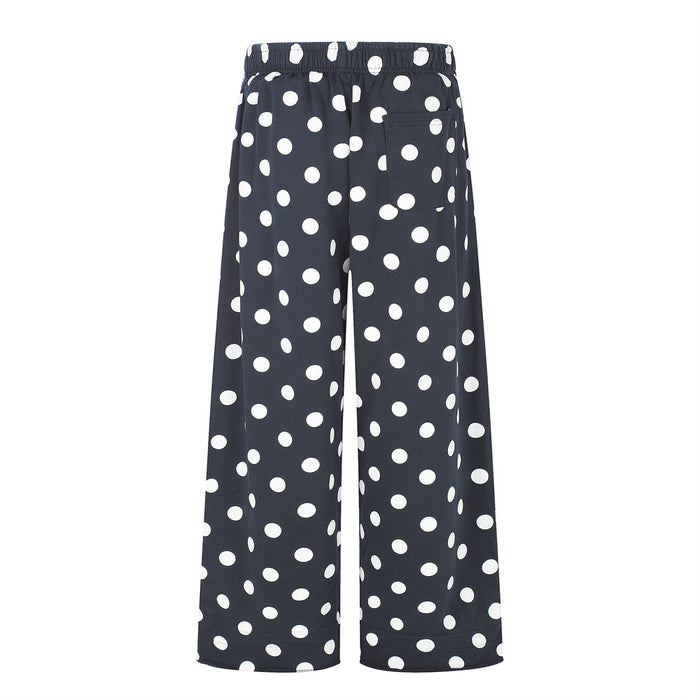 Navy polka dot wide-leg pants, back view with pocket