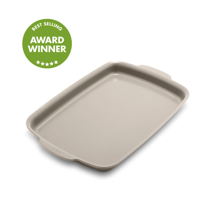 Taupe ceramic 13x9 quarter sheet pan with handles and a green Best Selling Award Winner label.