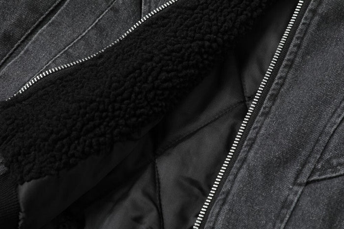 Close-up of black sherpa collar and quilted lining beside the front zipper