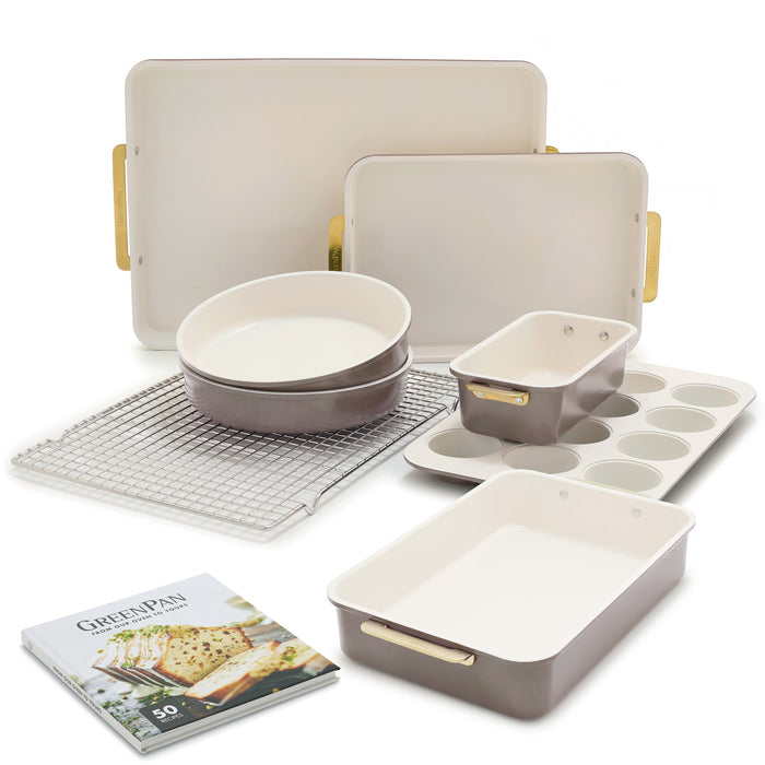 8-piece latte-colored aluminized steel bakeware set, including a cooling rack and recipe book.
