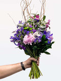 Bloomable Resilience Bouquet with purple alstroemeria and sturdy willows, symbolizing strength and tenderness, South Africa.