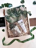 Scented Joy gift set featuring Joy Republic Vanity Bag, Soft Pots with succulent, and Cape Island Clifton Beach Cream in a box.