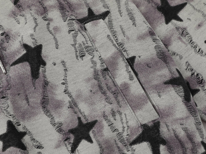 Close-up of front pocket seam and washed star print fabric