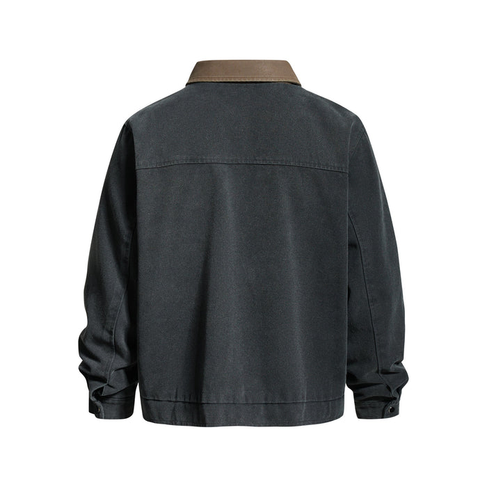 Back view of black cropped work jacket with beige collar