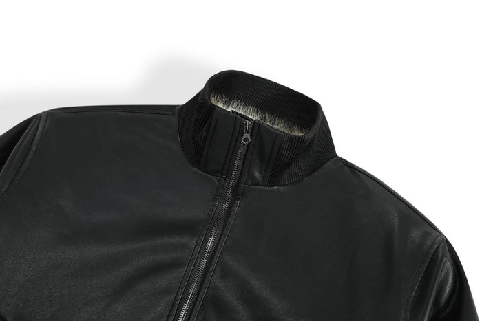Close-up of the black bomber jacket collar and top zipper with fur lining