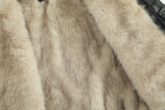 Close-up of the soft beige fur lining inside the bomber jacket
