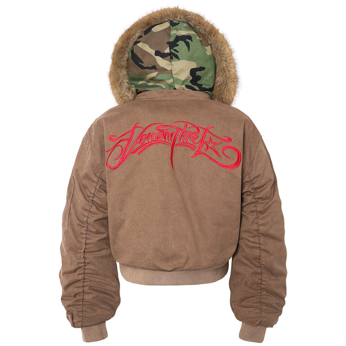 Back view of brown bomber jacket with fur-trim hood and large red embroidered script