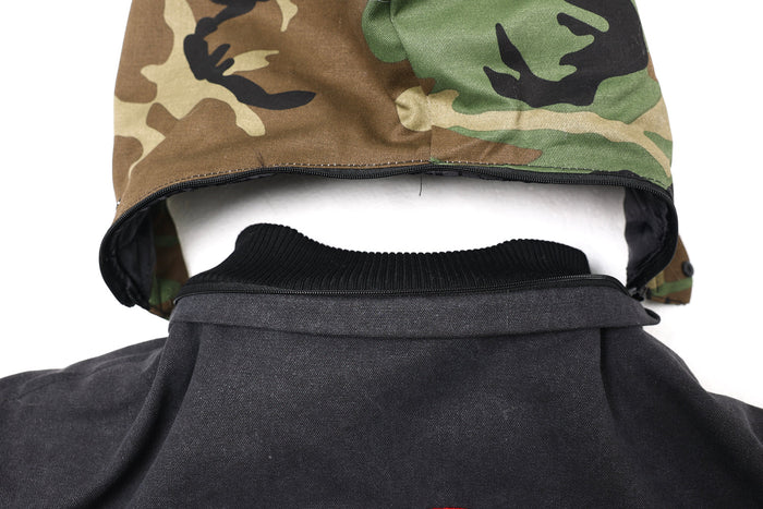 Inside neck area of camouflage hood with black ribbed collar