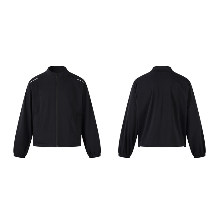 Front and back view of a black minimalist nylon track jacket with reflective shoulder piping and elasticated cuffs