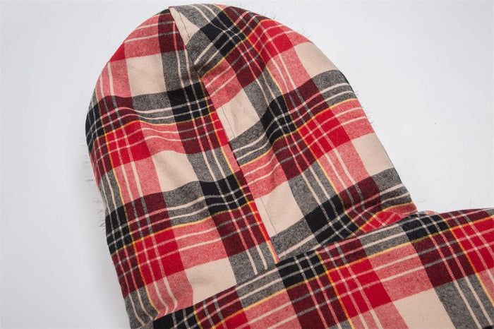 Close-up of red plaid jacket hood and top back seam