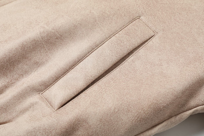 Beige bomber jacket sleeve pocket detail on soft textured fabric